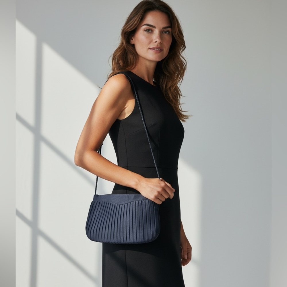 Pacific Connections black pleated evening bag.